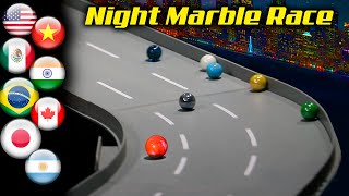 Night marble race with country marbles in Glasscar track