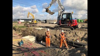 Digging a trench for casing pipes with my Takeuchi tb290 and tiltrotator