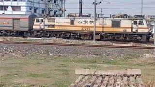 Train 13022 Mithila Express with HWH WAP7 37215 approaching Muzaffarpur and 15903 DBRG CDG departing